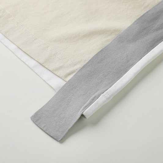 Women's simple and loose mid length T-shirt with contrasting color splicing and raglan sleeves top