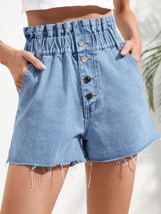 Fashionable high waisted loose and slimming denim shorts with frayed edges