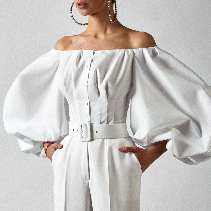 Spring and summer new design sense long sleeved bubble lantern sleeves with shoulder leakage European and American women's shirt top